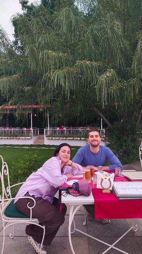 Simone and Valeria in a garden restaurant